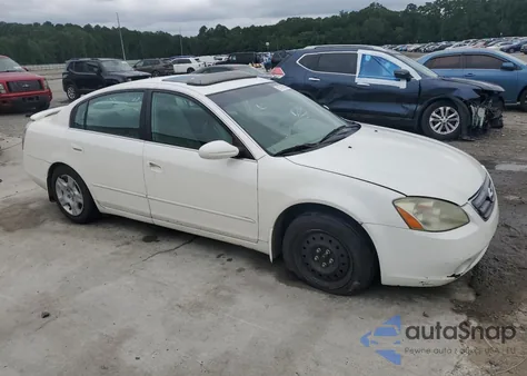2003 Nissan Altima Base z USA, uszkodzony, nr VIN 1N4AL11D63C242836
